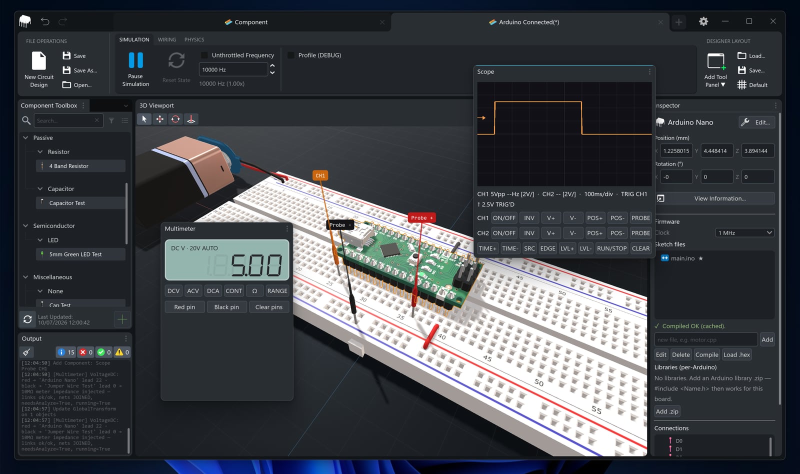 CRUMB Advanced dev build with an Arduino Nano on a breadboard, an oscilloscope showing a square wave and a multimeter reading 5.00 V