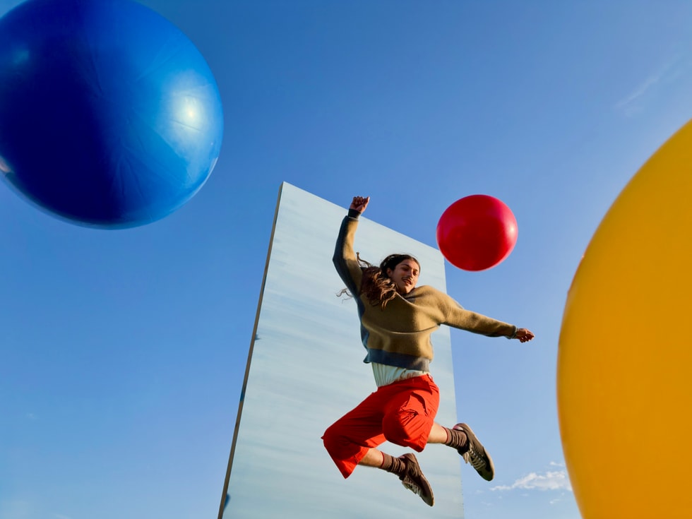 Apple promotional photo showcasing the iPhone Duo's 48MP Fusion camera