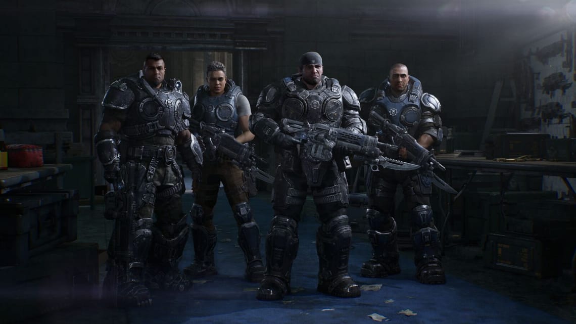 Four armoured COG soldiers from Gears of War: E-Day standing in a dark corridor